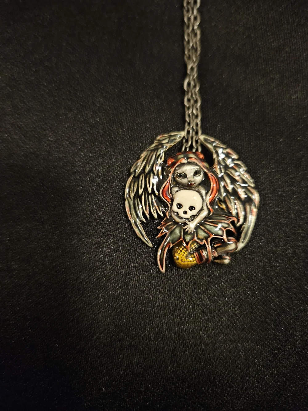 Silver Tone  Skull & Fairy Wing Pendant Necklace with Red Accents